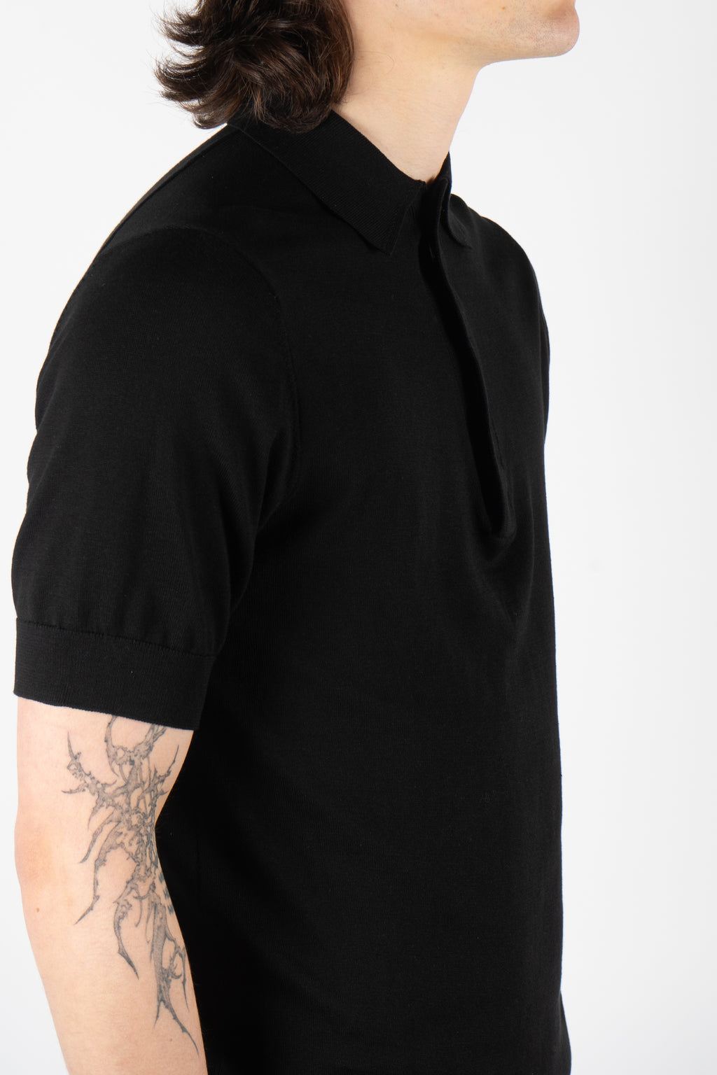 black knit polo shirt concealed placket