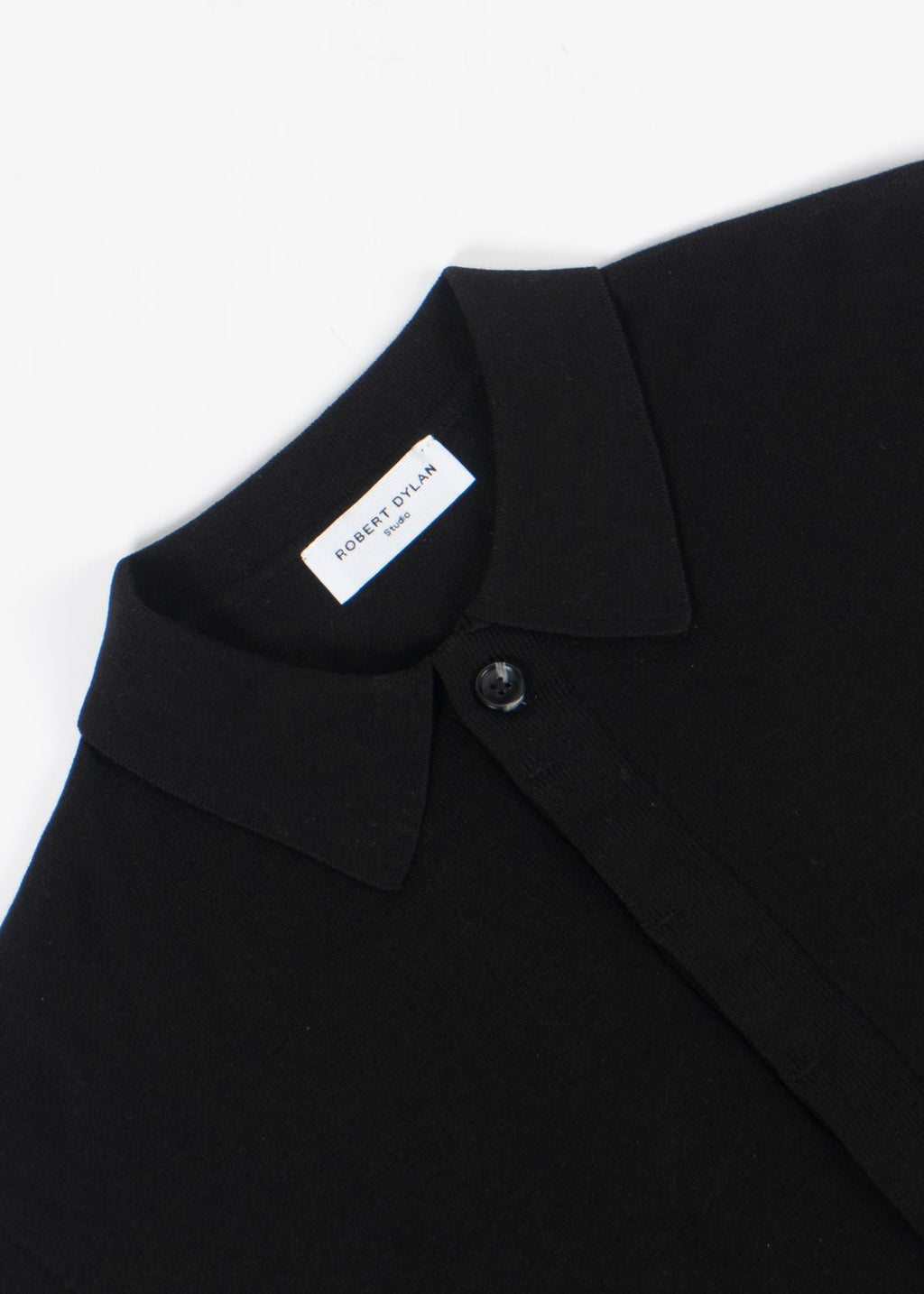 black knit polo shirt concealed placket