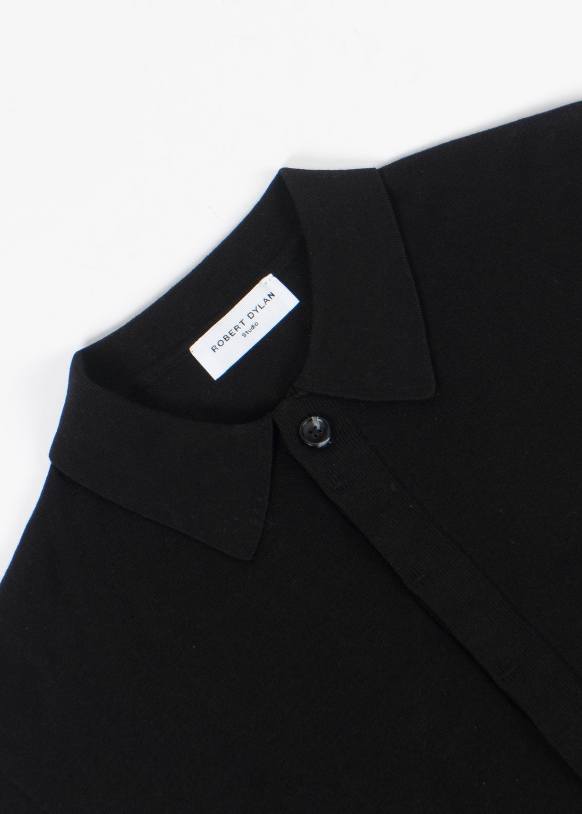 black knit polo shirt concealed placket